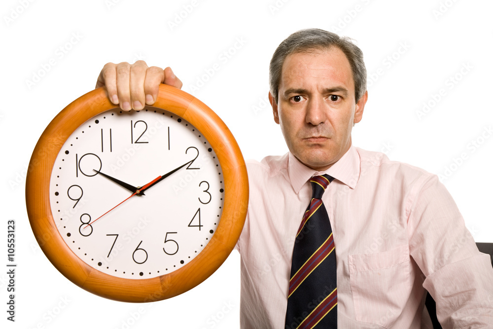 mature handsome business man holding a clock mature handsome business man holding a clock