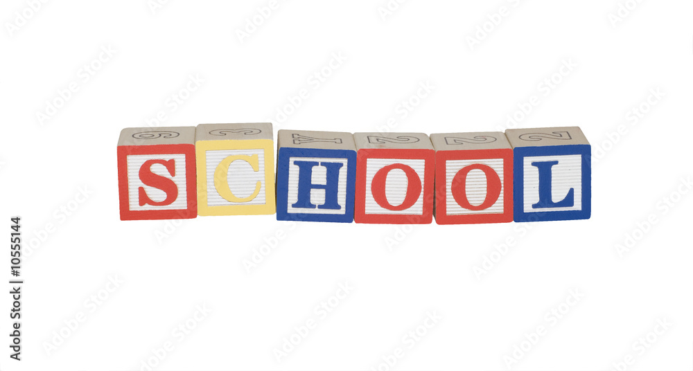 Toy block letters spelling school in primary colors Toy block letters spelling school in primary colors