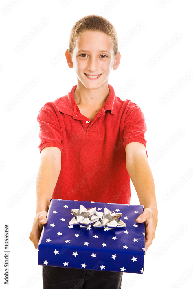 Cute little boy presenting you with a holiday gift. Isolated Cute little boy presenting you with a holiday gift. Isolated