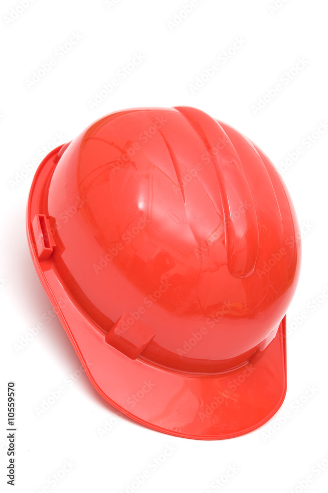 Fototapeta premium red helmet still life close up on white background