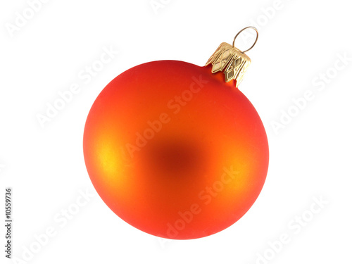 Orange glass ball on the light background. Clipping path.