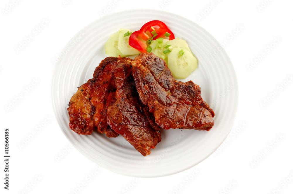 Grilled steak with vegetable salad isolated on white Grilled steak with vegetable salad isolated on white