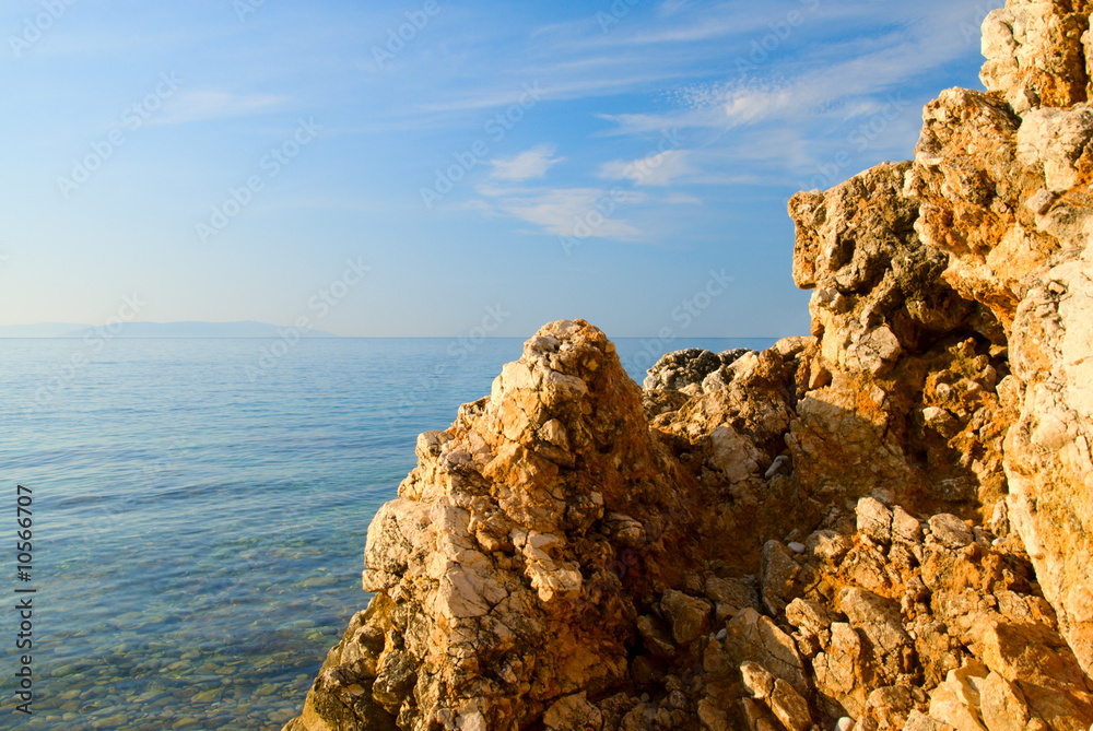 rock and blue water of Adriatic sea