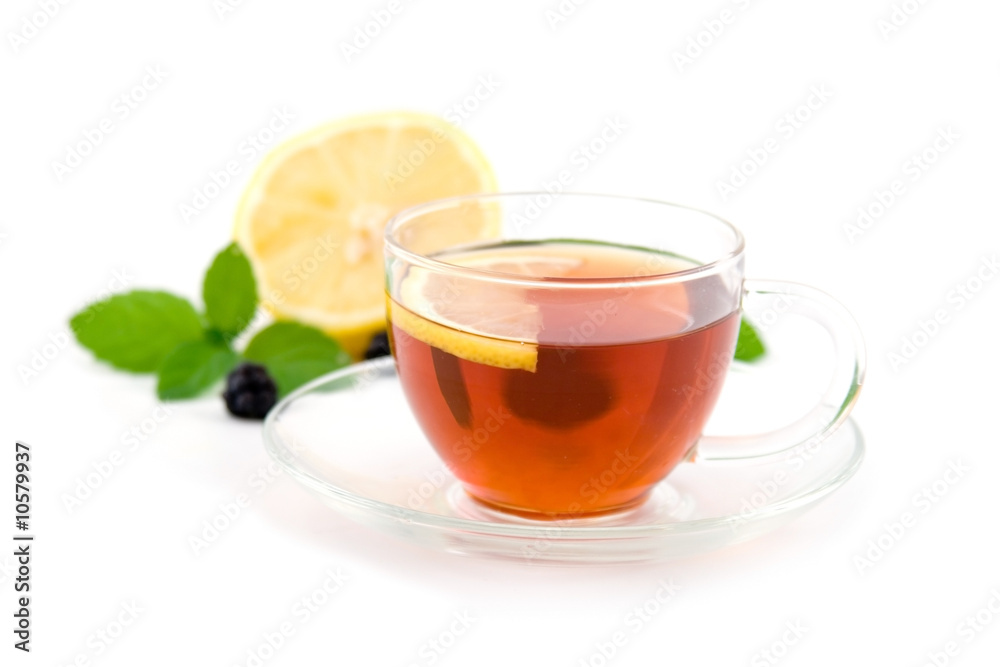 Transparent teacup with tea isolated