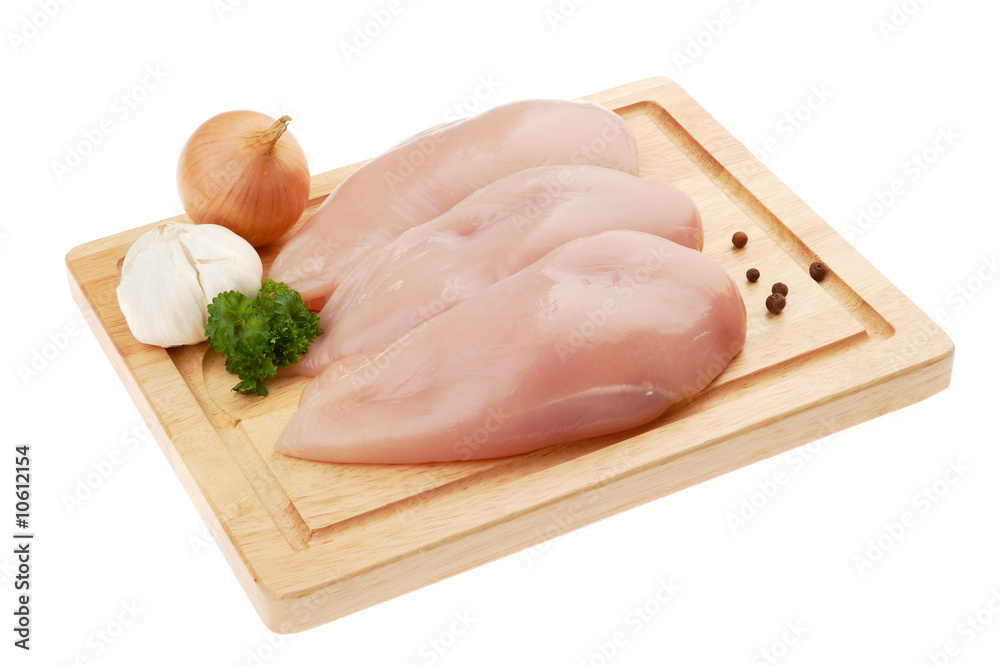 Raw chicken breasts isolated on white Raw chicken breasts isolated on white