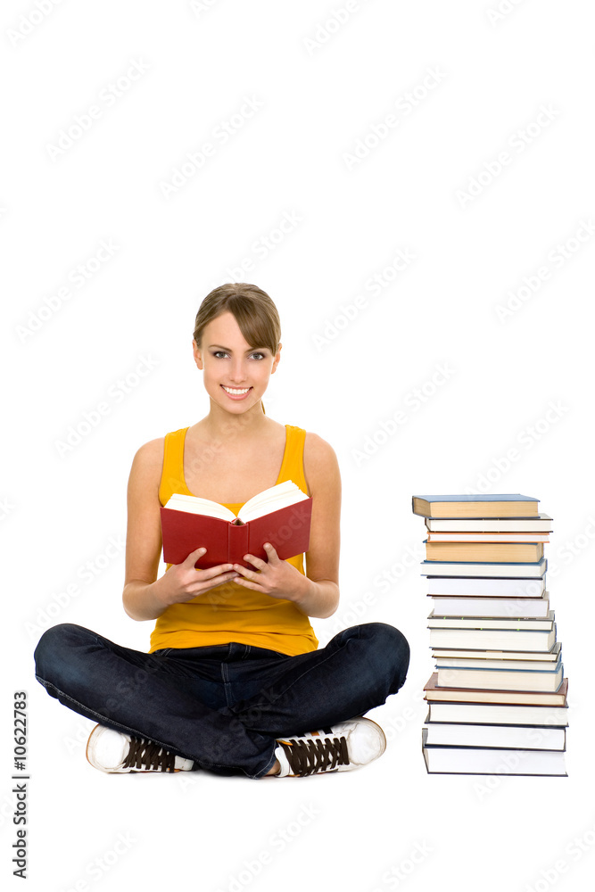 Fototapeta premium Female student sitting with books