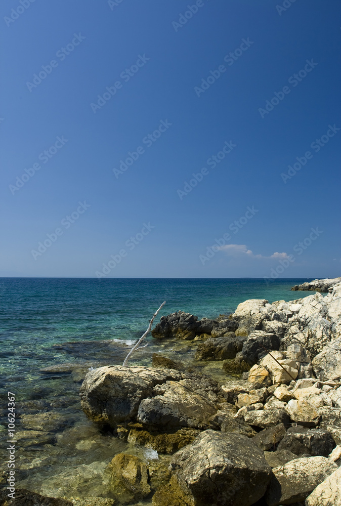 Adriatic sea beach with barb wire, island Pag, Croatia