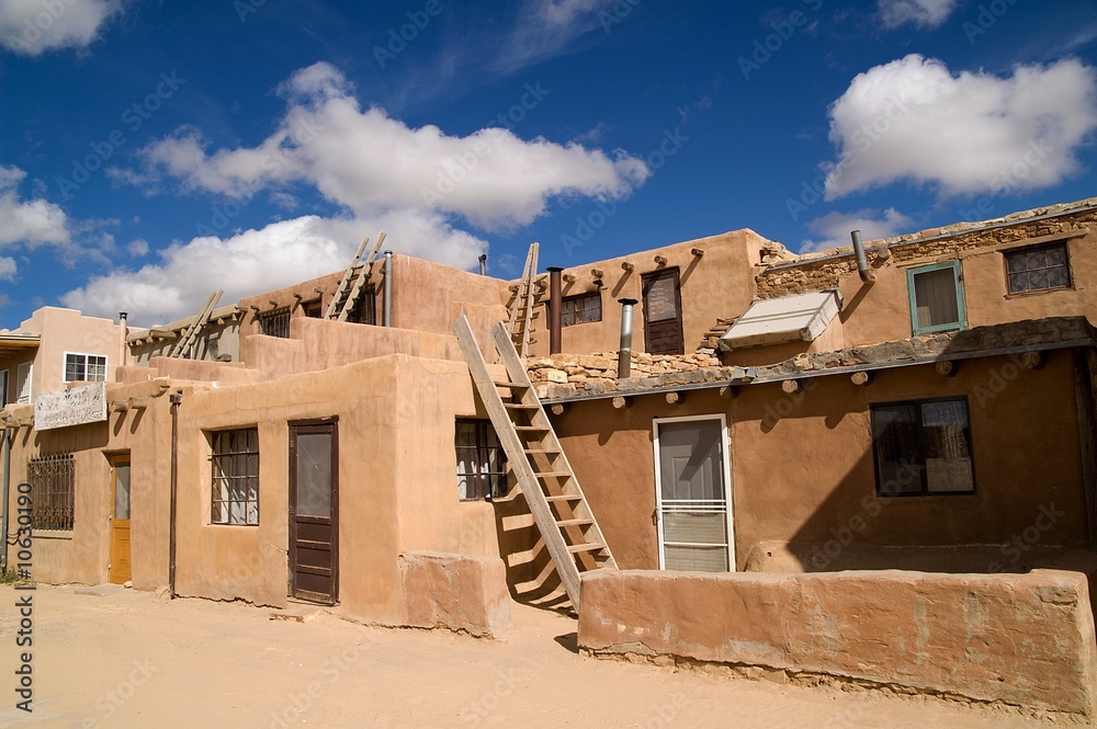 Kivas and ladders in pueblo Kivas and ladders in pueblo