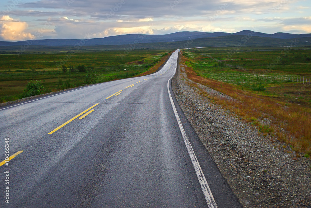 Picturesque autumn landscape with the road