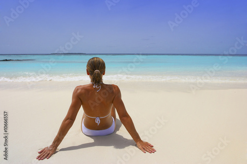 young woman on tropical beach