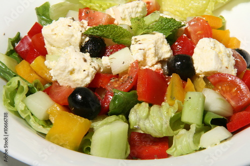 Greek salad on white dish
