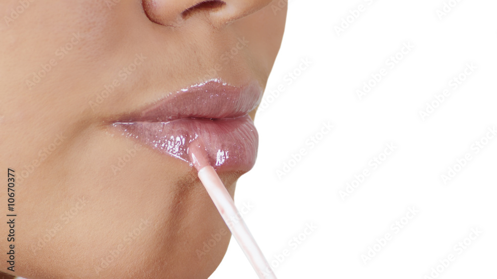 Naklejka premium beautiful girl dyes lips