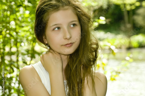 Cute young girl in park