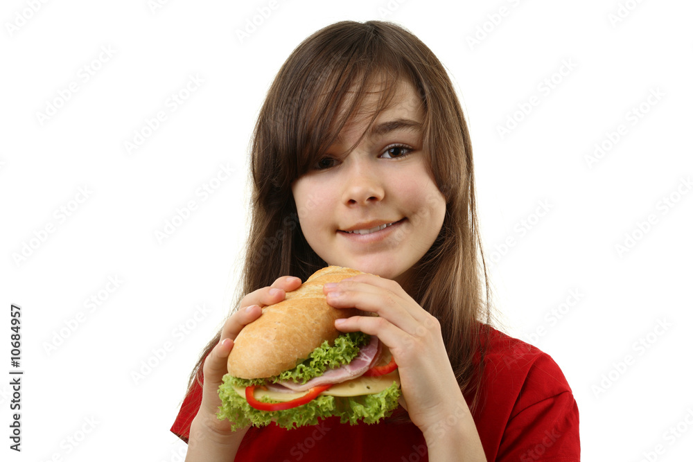 Girl eating healthy sandwich isolated on white background