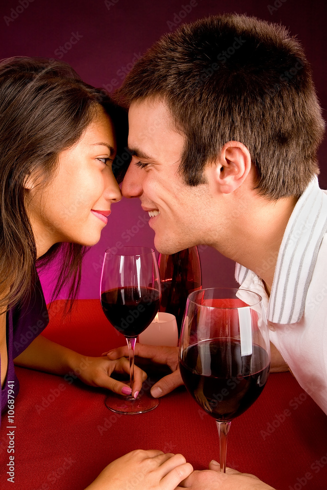 Couple Getting Closer While Having Wine Couple Getting Closer While Having Wine