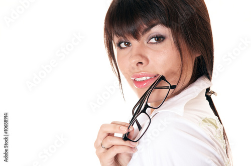 Young businesswoman with folder. Isolated on white.