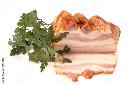 Fresh smoked tasty bacon isolated on white background.