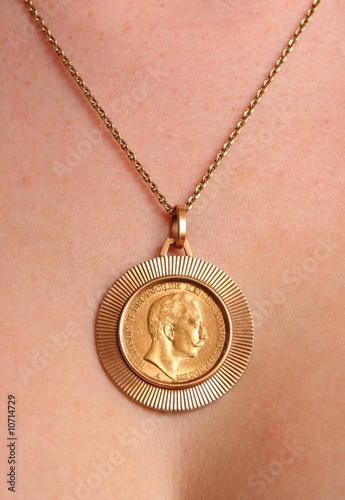 Necklace with old gold coin.