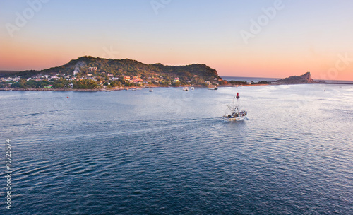 Fishing Boat in Mazatlan Heading out to Sea