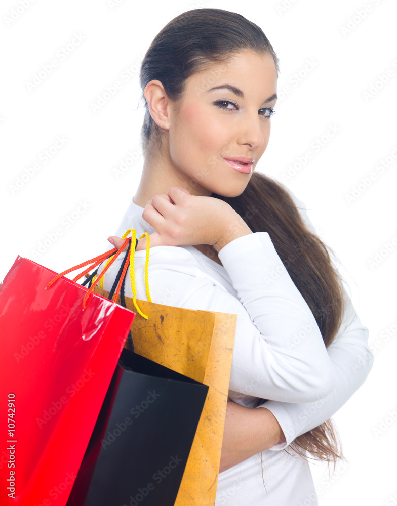 Attractive woman with paper shopping bags, isolated Attractive woman with paper shopping bags, isolated