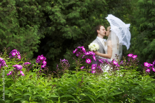 Bride and groom in the garden