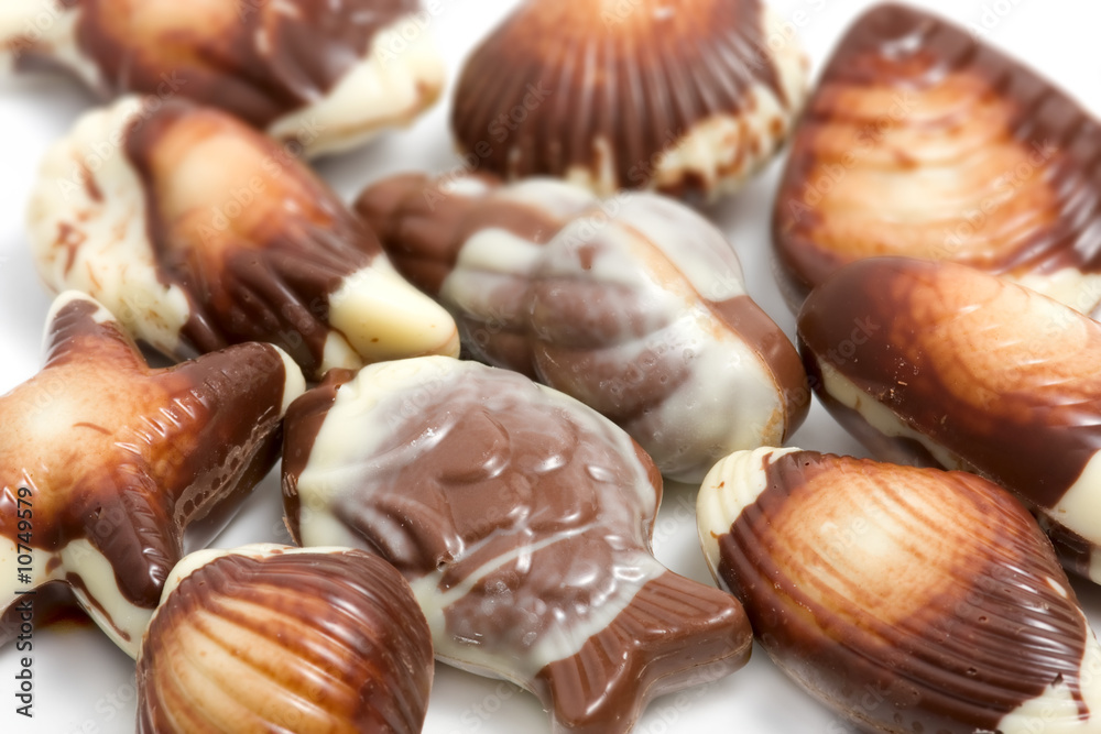 Chocolate pralines against white Chocolate pralines against white