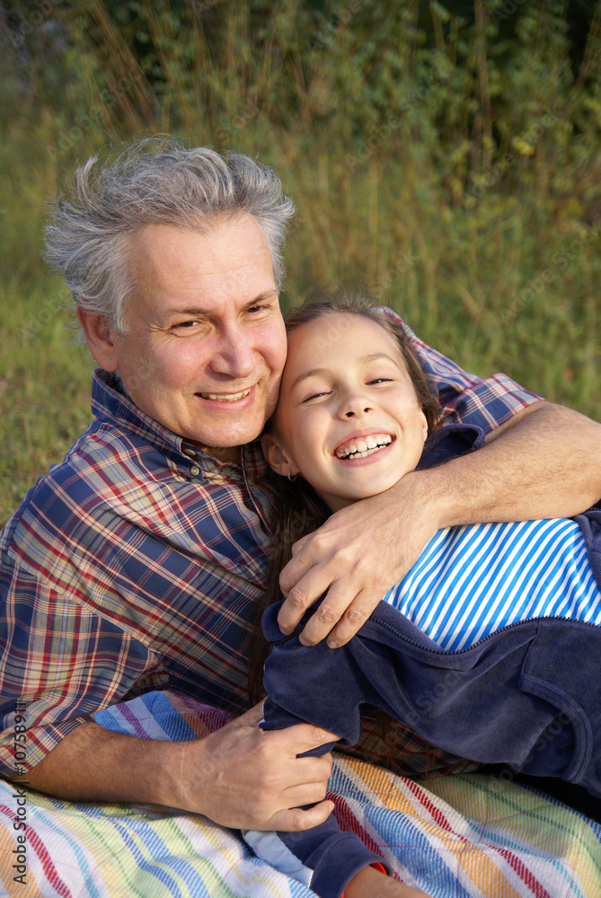 Cheerful father and daughter talking
