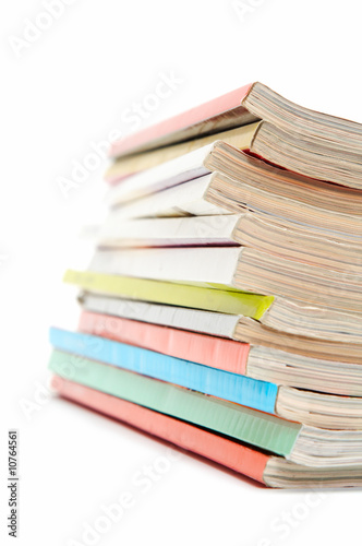 heap of magazines, focus on the top of the heap