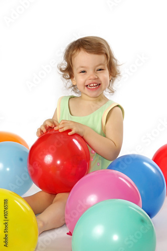 Little girl and balloons.