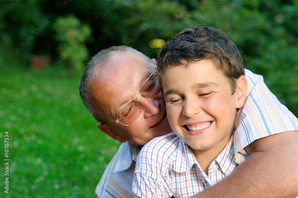 Grandfather and grandson having fun