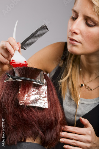 Obraz na plátně Hair stylist at work