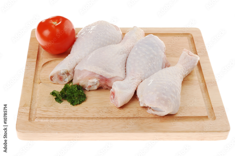 Raw chicken legs isolated on white background Raw chicken legs isolated on white background