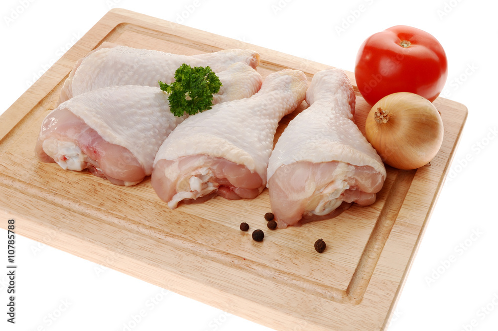 Raw chicken legs isolated on white background