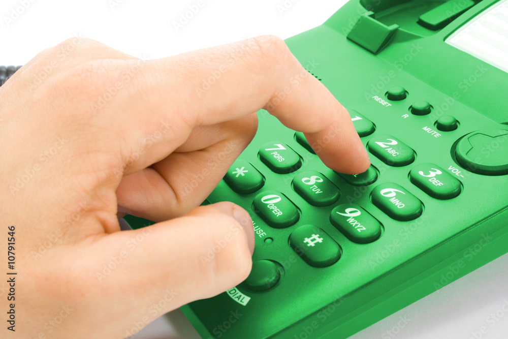 fingers dialing number on telephone fingers dialing number on telephone