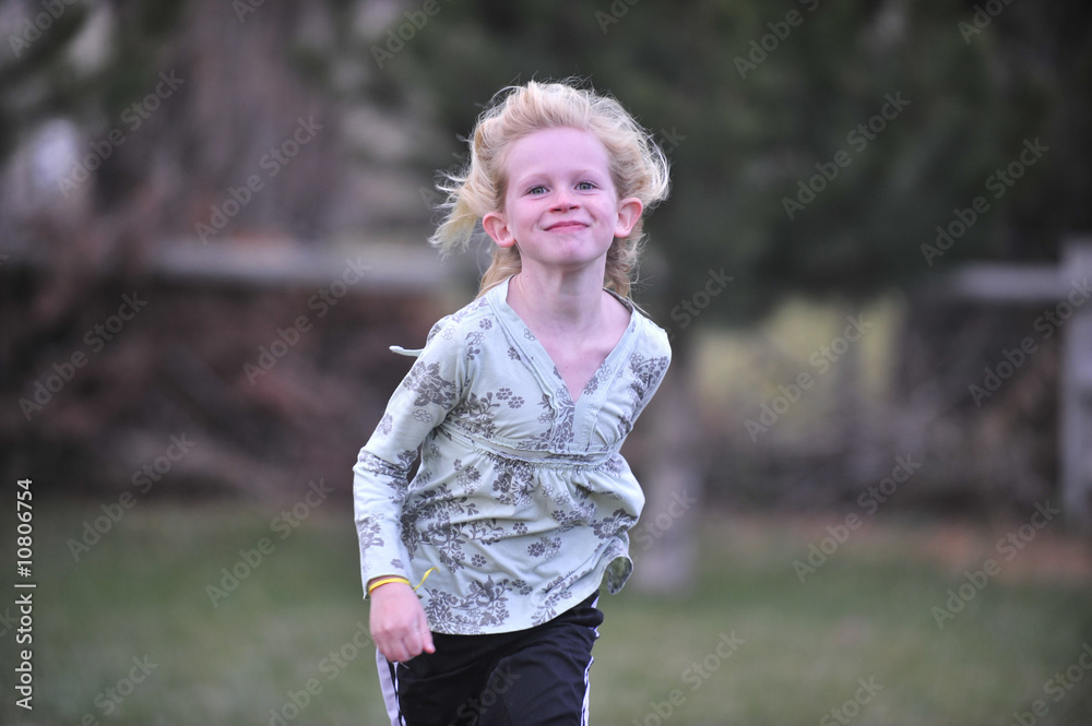 Fototapeta premium Young girl running