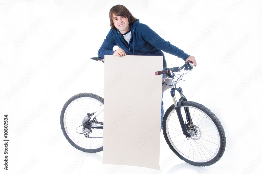 Fototapeta premium Young man with bicycle and space for your text
