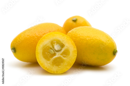 fresh kumquat on white background