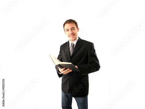 Young businessman with a book