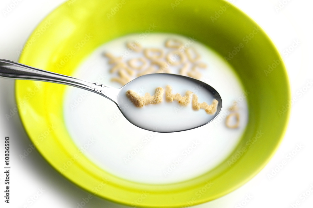 Bowl of milk and cereal with Bowl of milk and cereal with