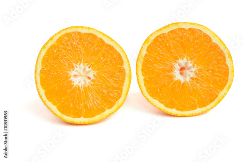 Half of orange isolated on white