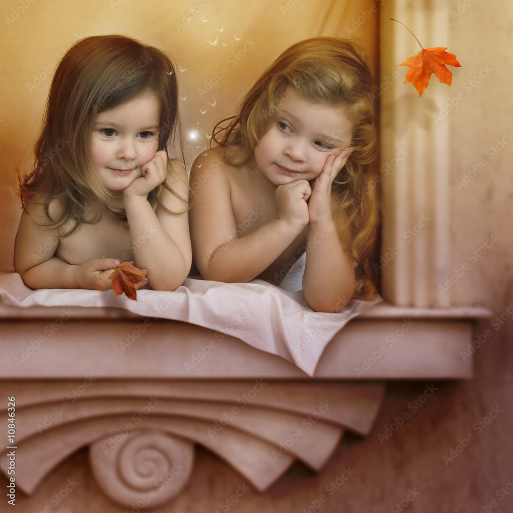 Two angels on the window