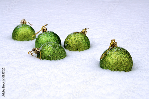 Some New Year's balls in a snowdrift