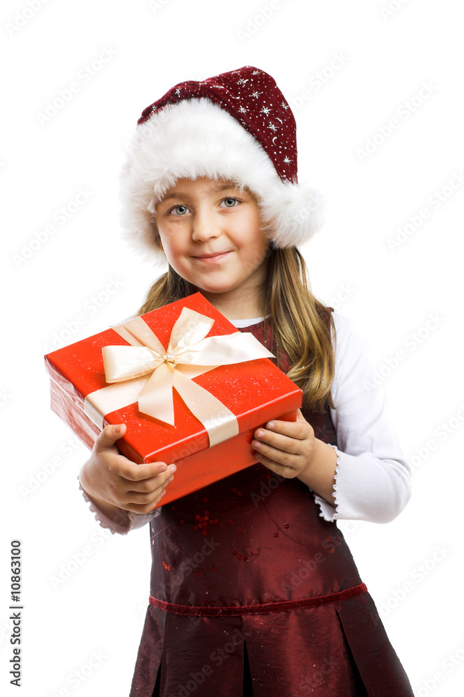 smiling six year old girl with a gift isolated on white smiling six year old girl with a gift isolated on white