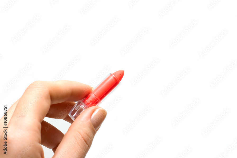 Red chalk in human hand