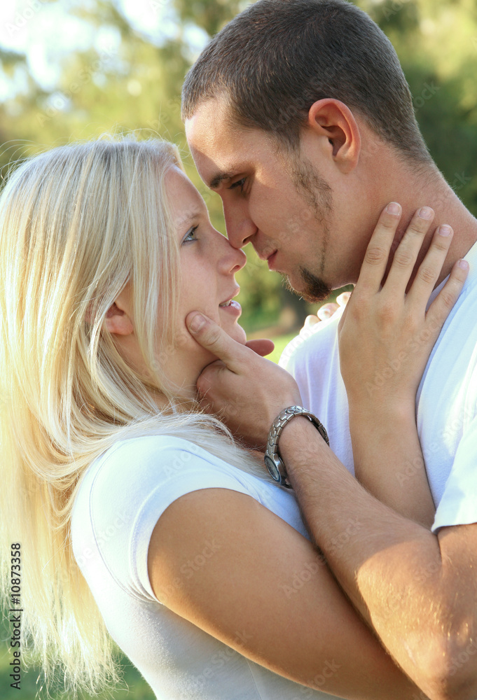Romantic Caucasian Couple Embracing In Park Romantic Caucasian Couple Embracing In Park