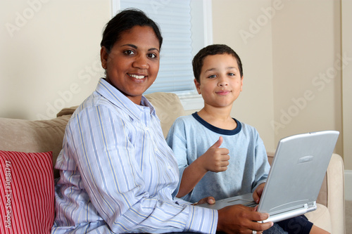 Woman and Boy On Computer