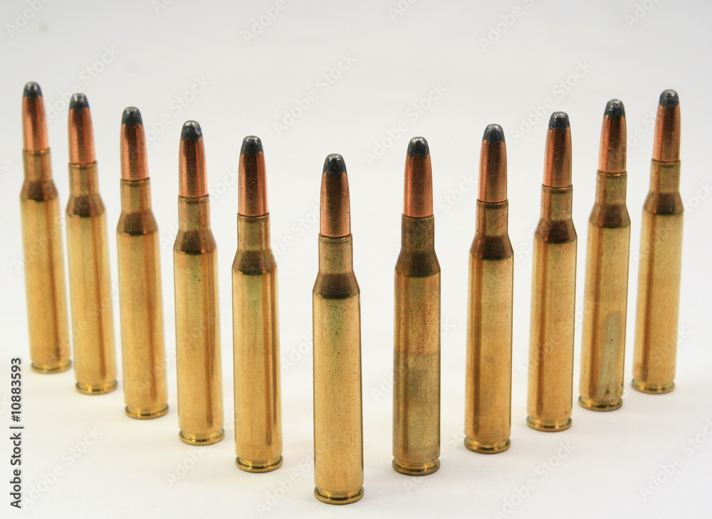 Rifle shells in a row Rifle shells in a row