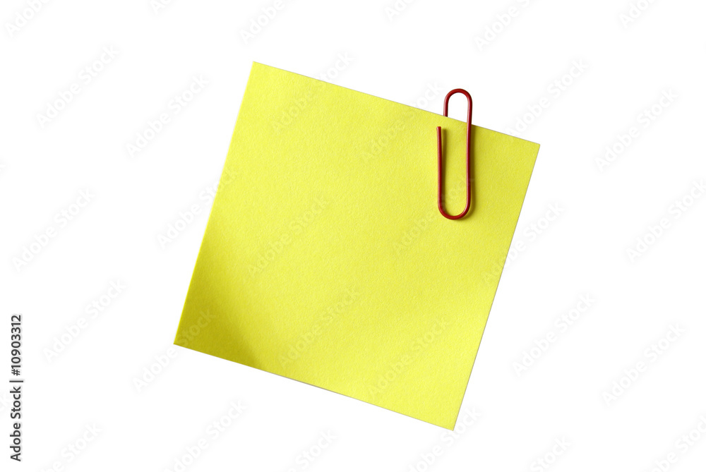 Yellow sticky notepaper with red paper-clip isolated on white. E