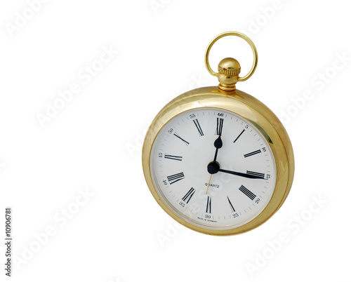 Brass clock on white