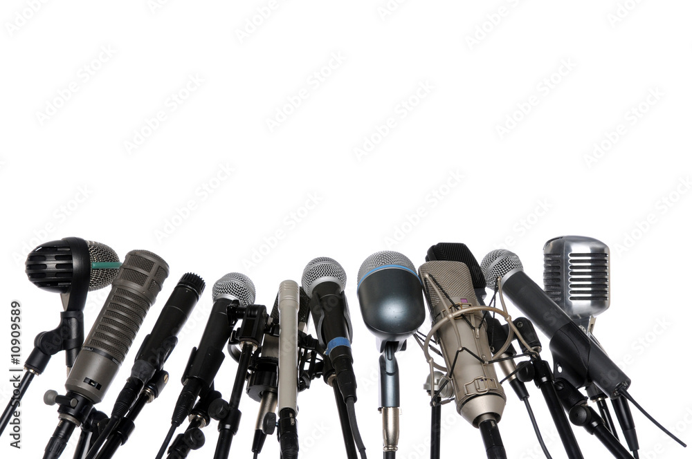Naklejka premium Microphones At Press Conference